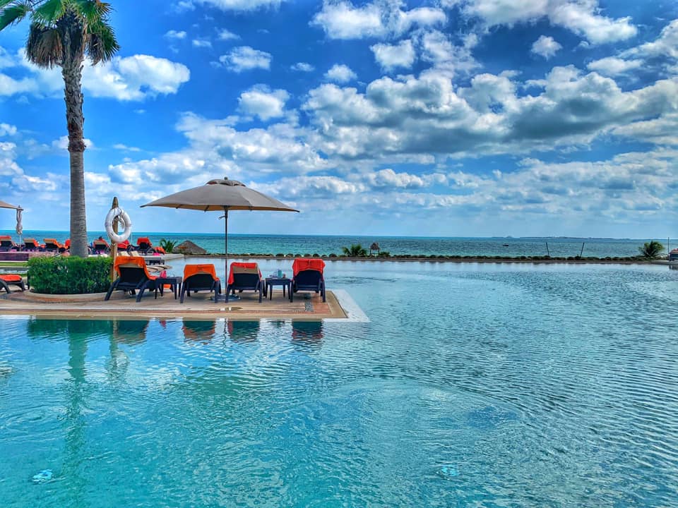 Secrets Playa Mujeres Golf & Spa Resort - Upgrade to Preferred Club for access to an exclusive lounge where you can find fine liquors for your delight! #UnlimitedLuxury