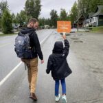 Adventures by Disney Alaska girl with sign