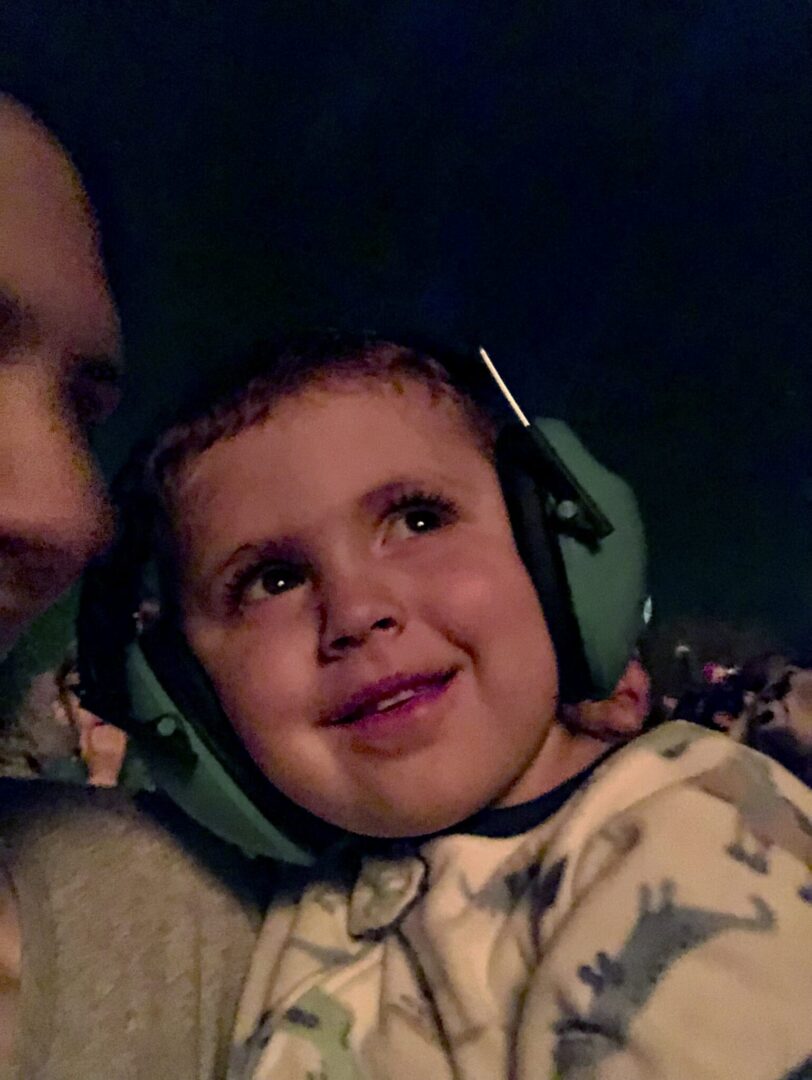 Toddler watching fireworks