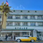 Classic hotel and vintage car seen on Ocean Drive in South Beach during a one day trip