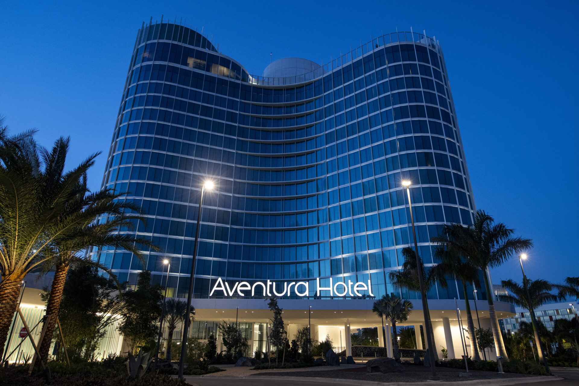 Nighttime exterior of Universal's Aventura Hotel